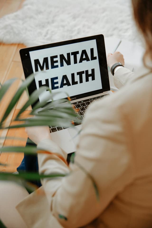 A therapist talking to a patient